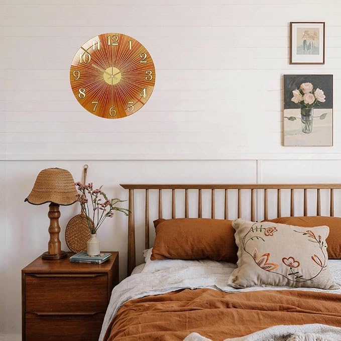 12 Inch Orange Sunburst Glass Wall Clock Silent Art Decor | Silent glossy clock with warm orange sunburst and gold numbers, accurately tracking time for your retro living room