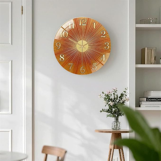12 Inch Orange Sunburst Glass Wall Clock Silent Art Decor | Silent glossy clock with warm orange sunburst and gold numbers, accurately tracking time for your retro living room