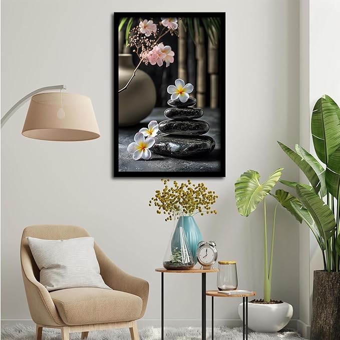A harmonious black stone stack paired with white and pink flowers bamboo and ceramic vases creates a tranquil Zen decor for minimalist homes and mindful spaces 20x30in Metal blackFramed