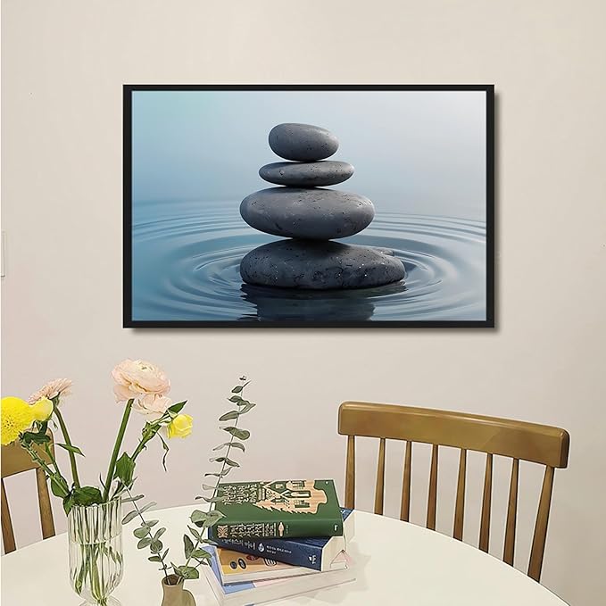 Zen wall art Harmonious grey stones stacked on a calm surface of water Serene Zen decor suitable for tranquil homes and spaces of meditation 16x24in Metal blackFramed