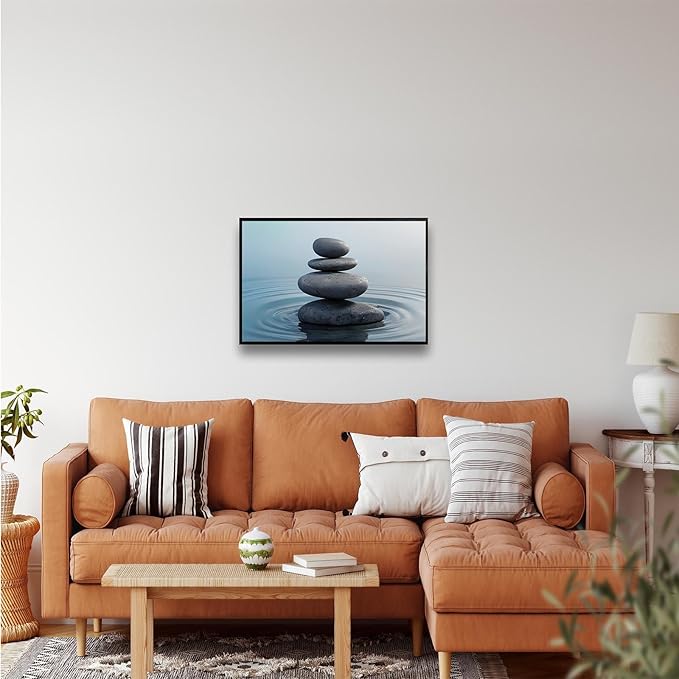 Zen wall art Harmonious grey stones stacked on a calm surface of water Serene Zen decor suitable for tranquil homes and spaces of meditation 20x30in Metal blackFramed