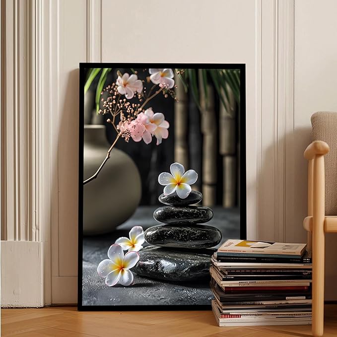 A harmonious black stone stack paired with white and pink flowers bamboo and ceramic vases creates a tranquil Zen decor for minimalist homes and mindful spaces 16x24in Metal blackFramed