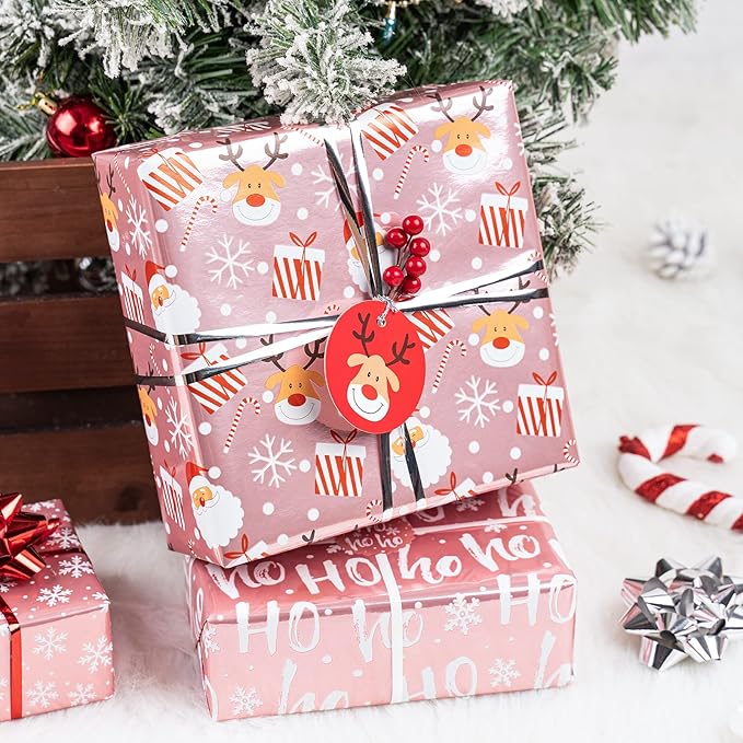LeZakaa Christmas Wrapping Paper Bundle - Mini Roll with Bow, Ribbon, Sticker and Gift Tag - Pink Metallic Foil Design with Snowflakes/Santa Claus/HO Print -17 x 120 inches -3 Rolls(42.5 sq.ft.ttl.)