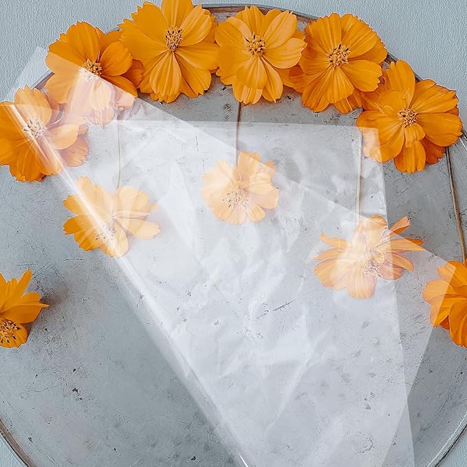 FOYTOKI 100pcs Clear Cellophane Wrapping Paper for Floral Bouquets Transparent Flower Packaging Film DIY Lightweight Floral Wrap for Weddings Birthdays Present