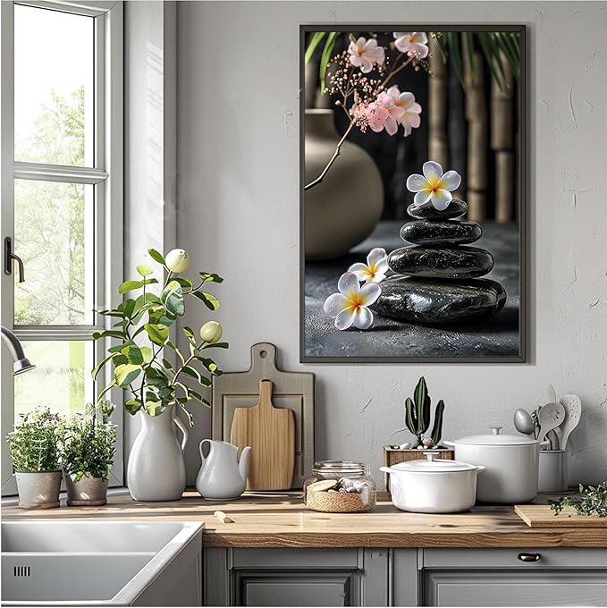 A harmonious black stone stack paired with white and pink flowers bamboo and ceramic vases creates a tranquil Zen decor for minimalist homes and mindful spaces 24x36in Metal blackFramed