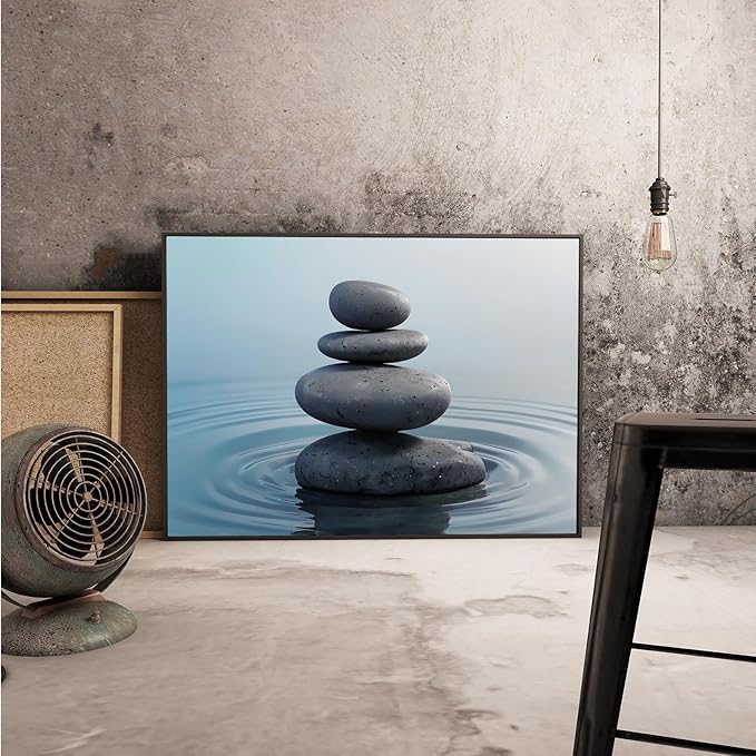 Zen wall art Harmonious grey stones stacked on a calm surface of water Serene Zen decor suitable for tranquil homes and spaces of meditation 16x24in Metal blackFramed