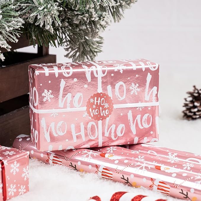 LeZakaa Christmas Wrapping Paper Bundle - Mini Roll with Bow, Ribbon, Sticker and Gift Tag - Pink Metallic Foil Design with Snowflakes/Santa Claus/HO Print -17 x 120 inches -3 Rolls(42.5 sq.ft.ttl.)