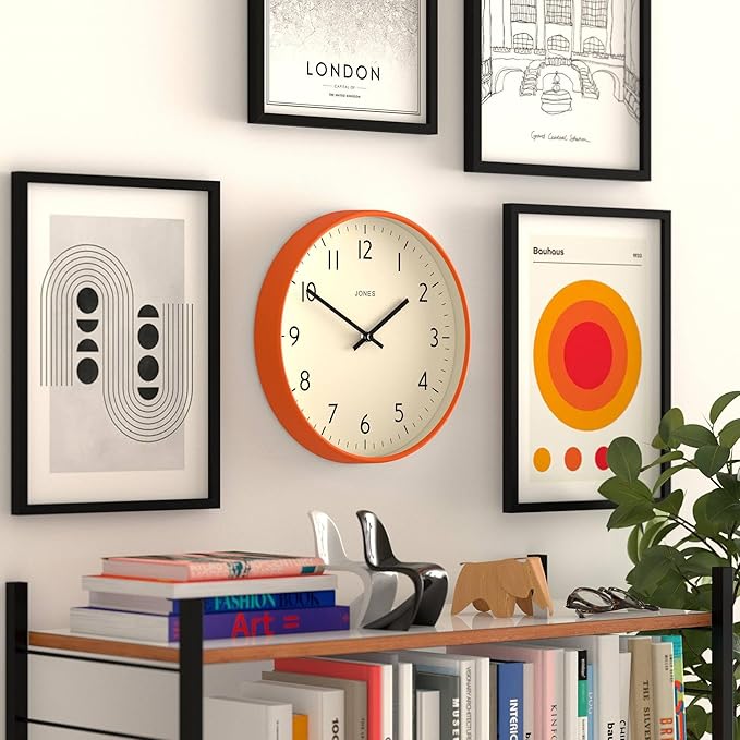 JONES CLOCKS® Studio wall Clock | Modern Round Style | 12 inch | Orange | Easy to Read Numbers | Versatile Design for Kitchen, Living Room or Office